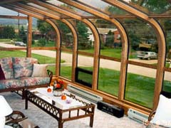 curved eave woodclad sunroom